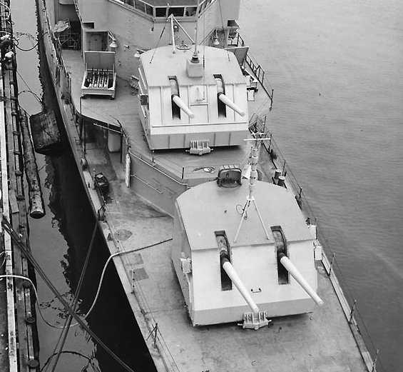 Black and white historic photo of WWII Naval Cannons